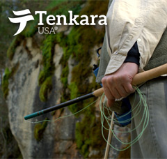 Fisherman holding a collapsed Tenkara Rod and Fly Line