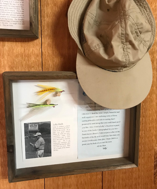 Lefty Kreh's Cap, a note to Byron and Paula Begley, and two flies tied by Lefty