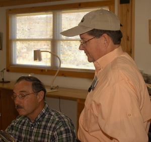 Instructor and student in a fly tying class.